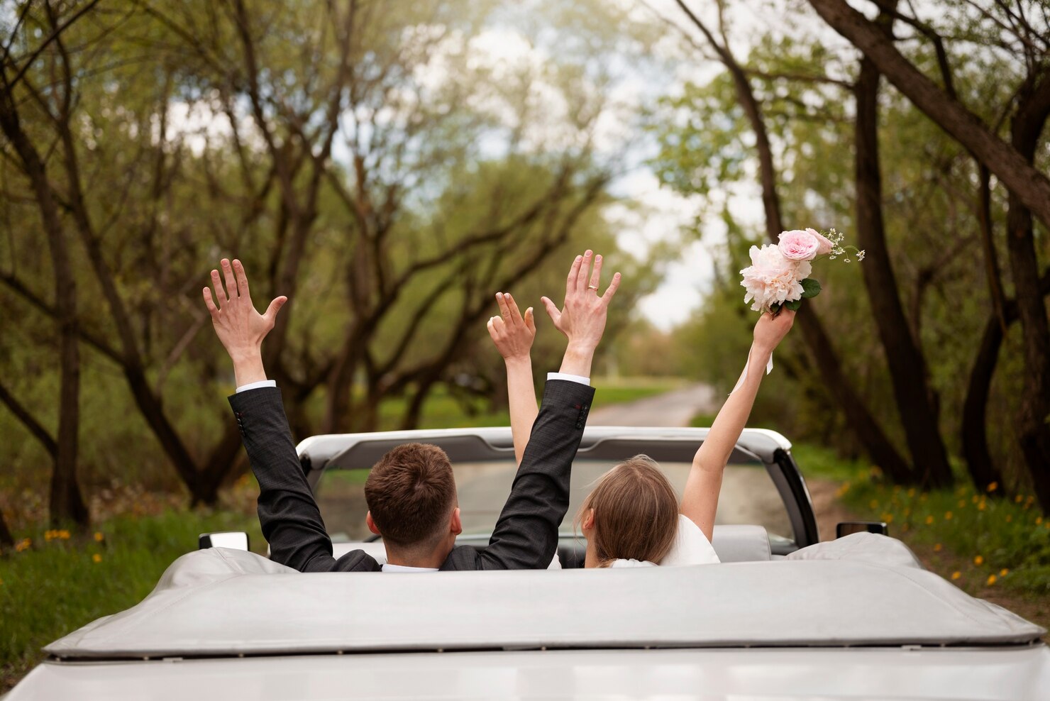 https://www.freepik.com/free-photo/just-married-couple-with-their-car_28481973.htm